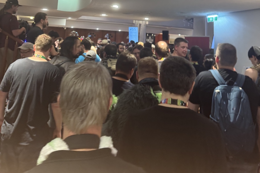 Tons and tons of people tightly crammed, nothing but heads visible